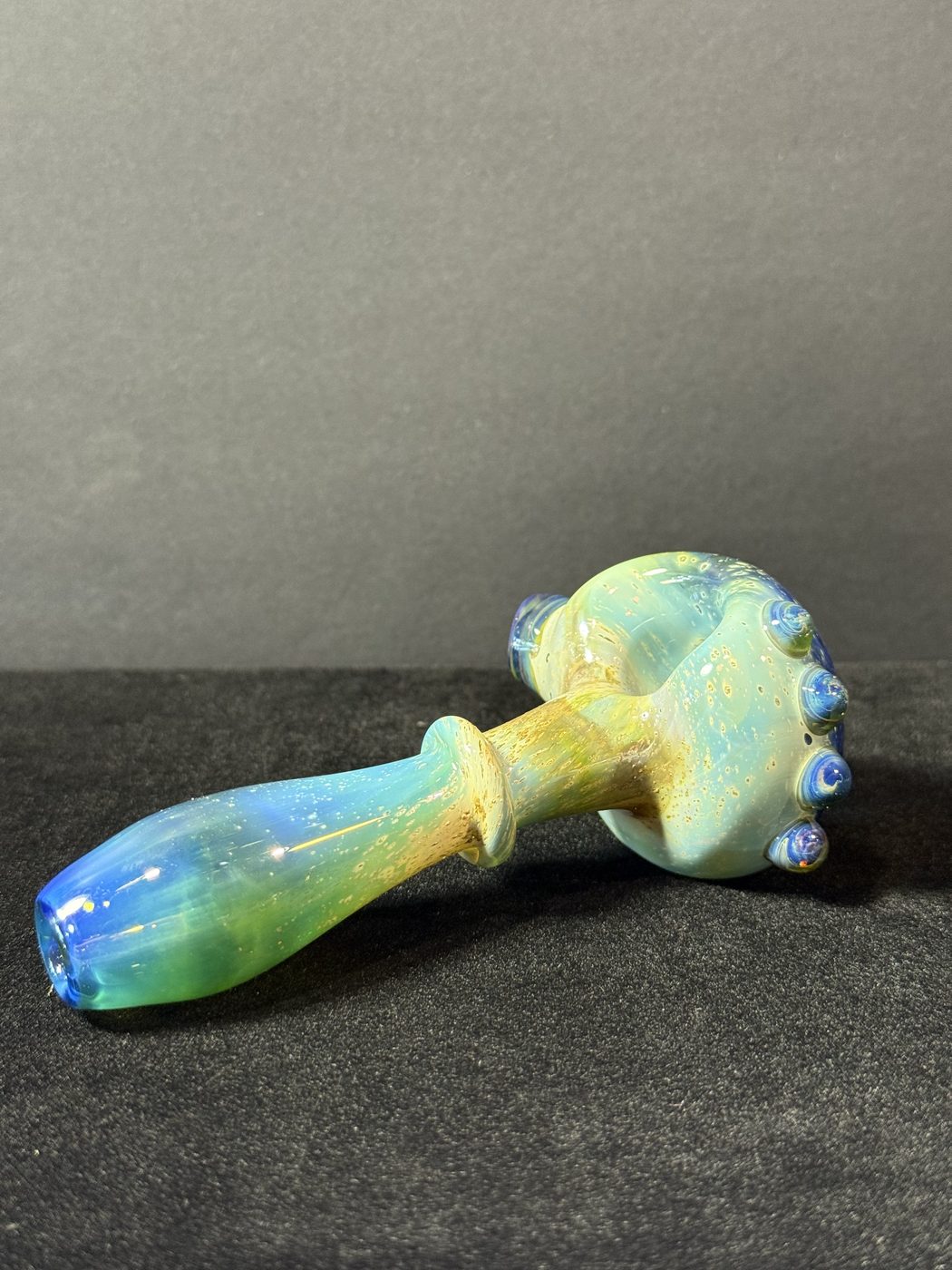 Blue & green dotted spoon at Mr. Wigz Smoke Shop