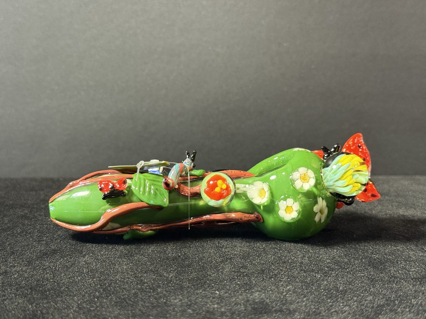 Green critter sherlock at Mr. Wigz Smoke Shop
