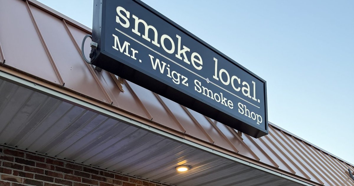 Mr. Wigz Smoke Shop storefront with the smoke local sign in Fenwick Island, DE